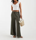 Pantalones anchos texturizados de talle alto cordón ajustable