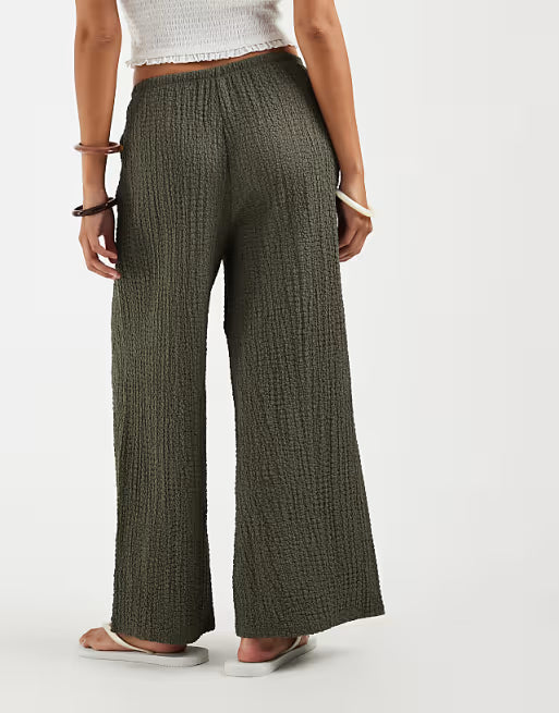 Pantalones anchos texturizados de talle alto cordón ajustable