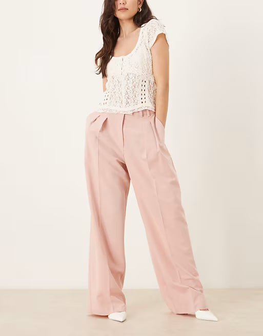 Pantalones sastre anchos rosa malva con pliegues