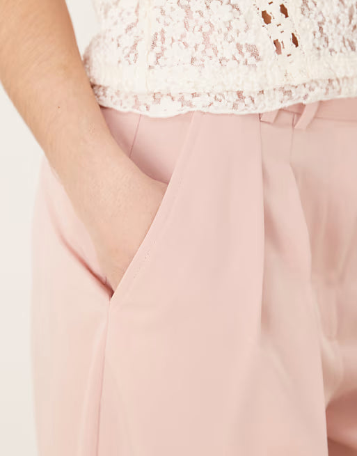 Pantalones sastre anchos rosa malva con pliegues